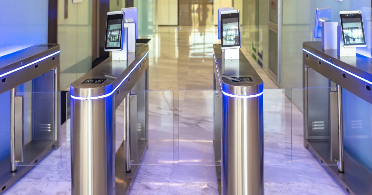 Secure turnstile entry gates in a modern office building